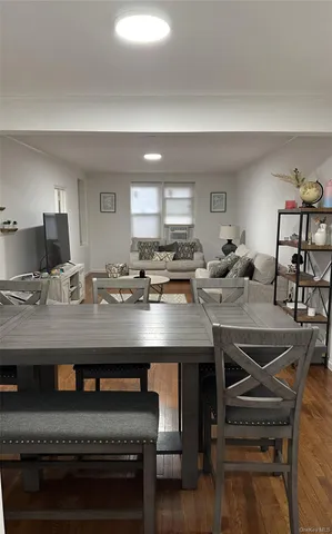 a kitchen with a table and chairs in it