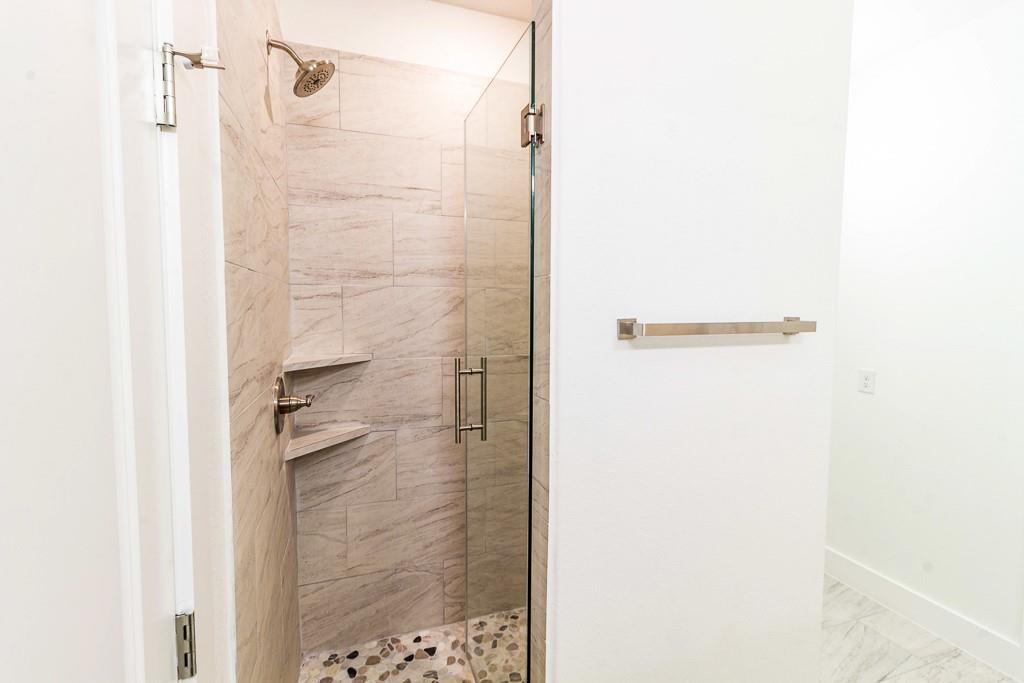 536 Highview Court Godley, TX 76044 - Photo 15 of 27 a bathroom with a shower