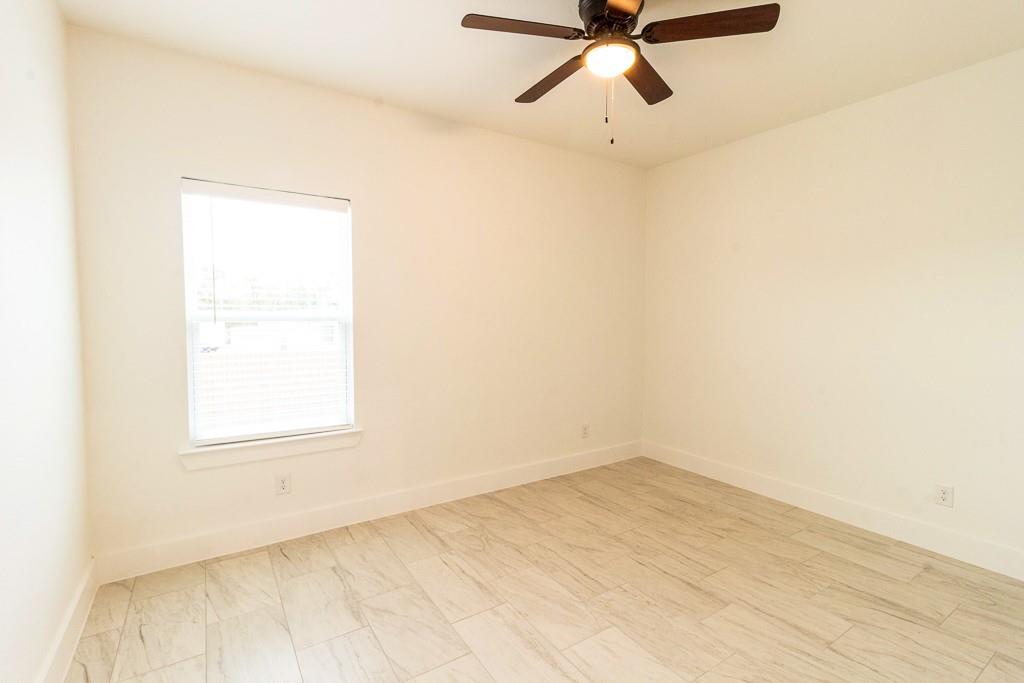 536 Highview Court Godley, TX 76044 - Photo 17 of 27 an empty room with a window
