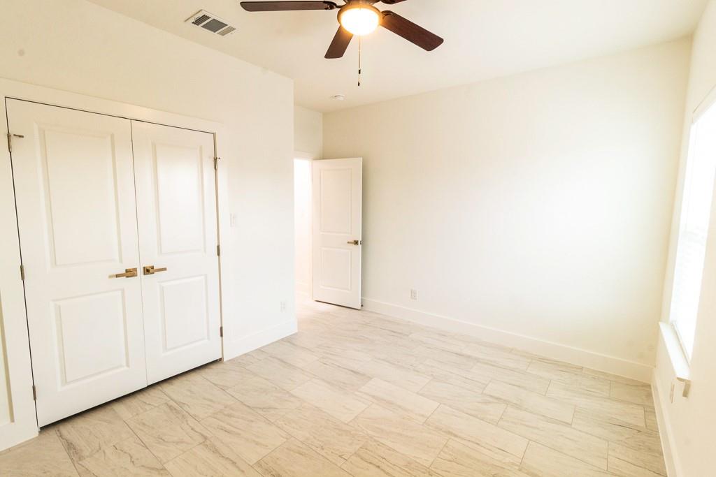 536 Highview Court Godley, TX 76044 - Photo 18 of 27 a view of empty room with ceiling fan