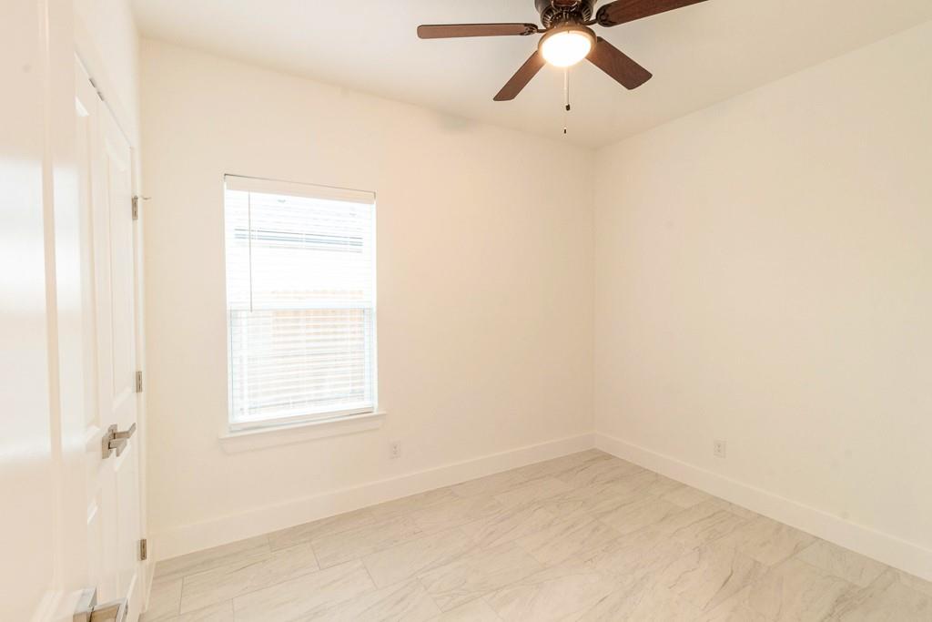 536 Highview Court Godley, TX 76044 - Photo 19 of 27 a view of an empty room with a window