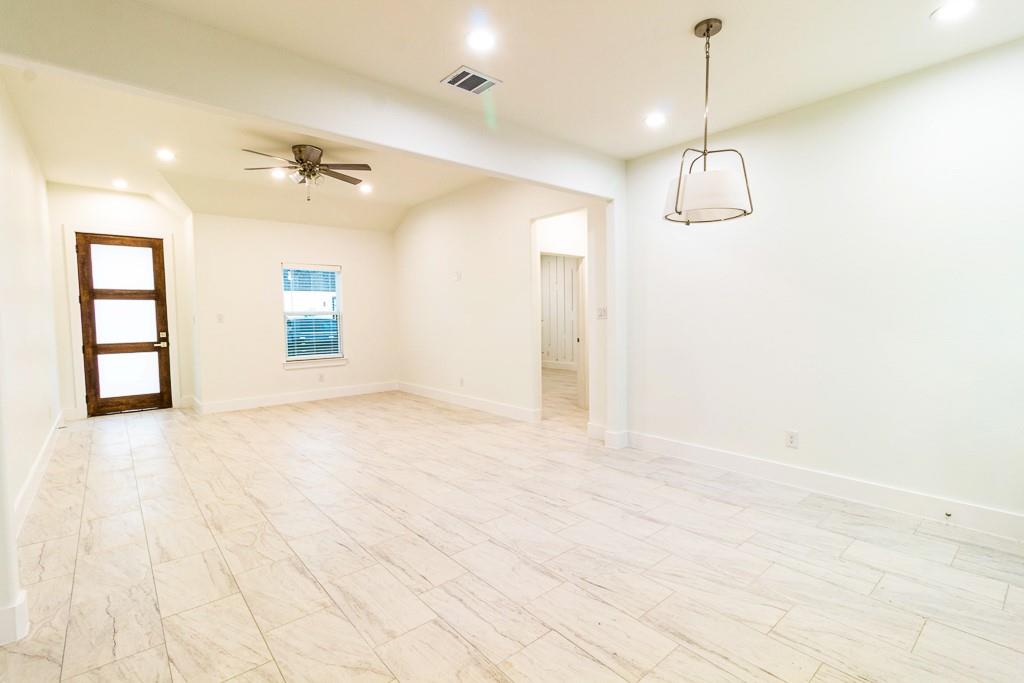 536 Highview Court Godley, TX 76044 - Photo 2 of 27 a view of an empty room with a window