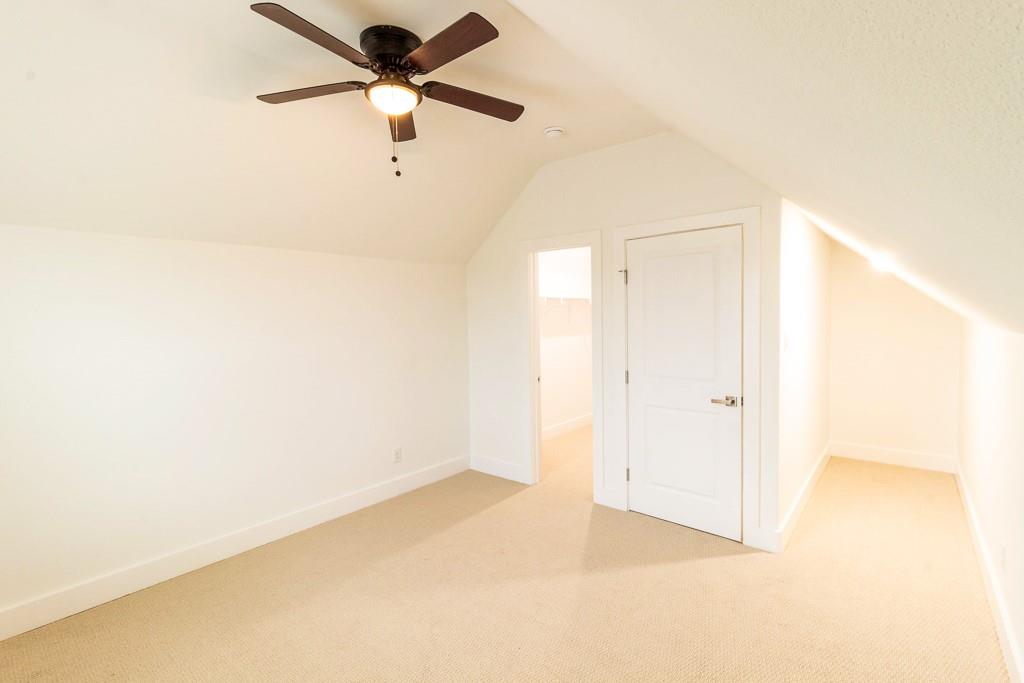 536 Highview Court Godley, TX 76044 - Photo 25 of 27 a view of a room with a ceiling fan and a window