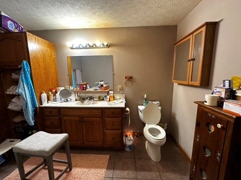 10716 County Line Road Greenville, PA 16125 - Photo 26 of 43 a bathroom with a toilet sink and mirror