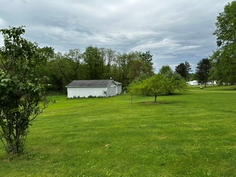 10716 County Line Road Greenville, PA 16125 - Photo 7 of 43 a view of a house with a big yard