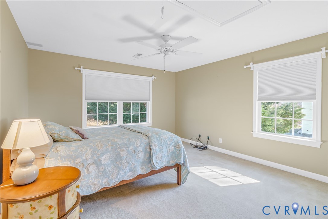 1159 Riverdale Road Warsaw, VA 22572 - Photo 30 of 42 a bedroom with a bed and a window