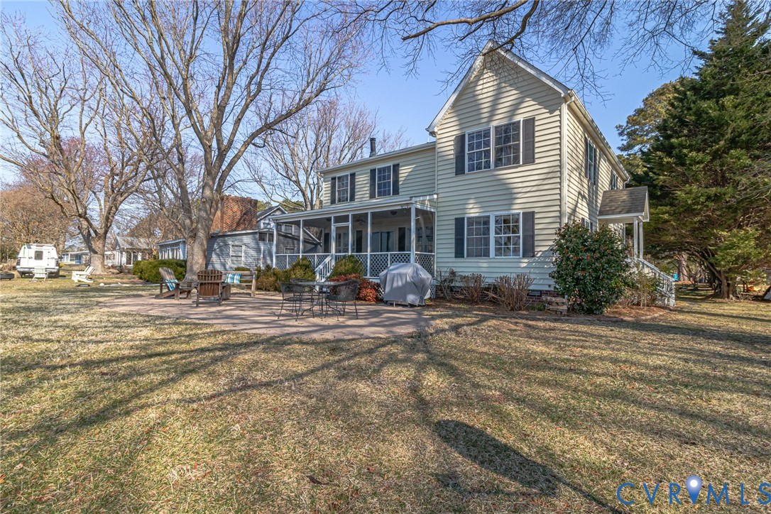 1159 Riverdale Road Warsaw, VA 22572 - Photo 37 of 42 a front view of a house with garden