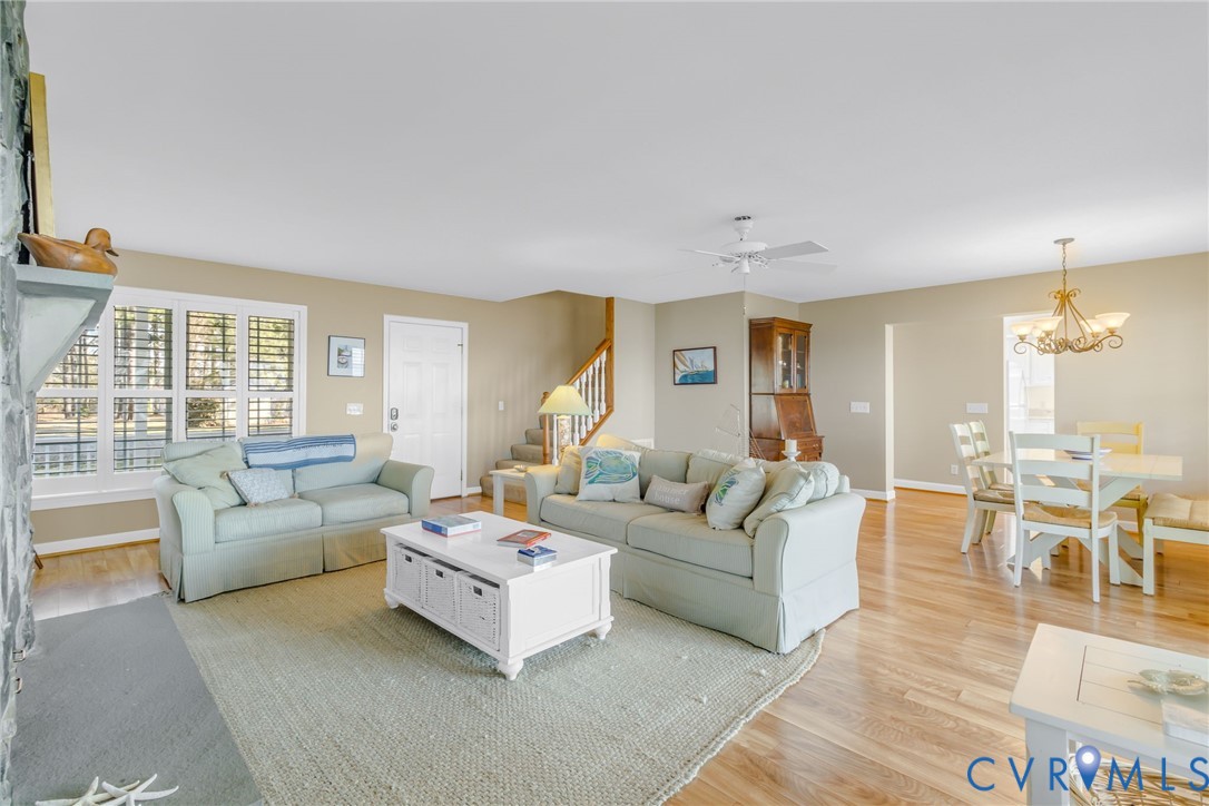 1159 Riverdale Road Warsaw, VA 22572 - Photo 7 of 42 a living room with furniture and a large window