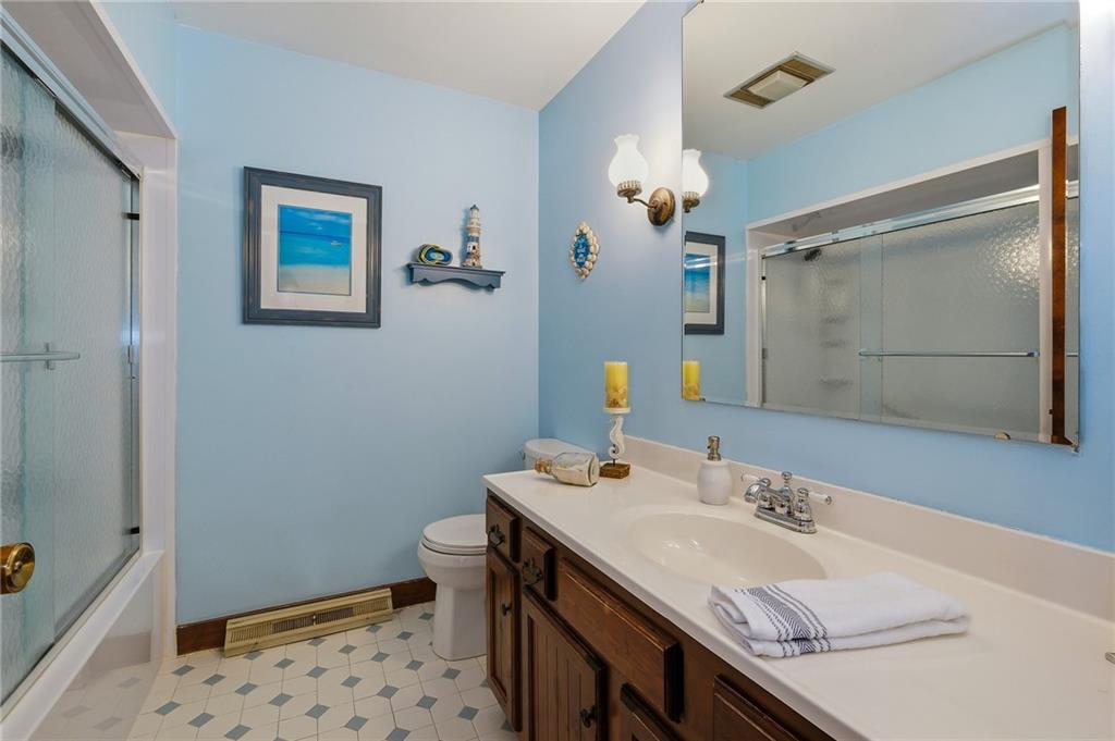 127 East Buffalo Church Road Washington, PA 15301 - Photo 20 of 33 a bathroom with a sink a toilet and shower