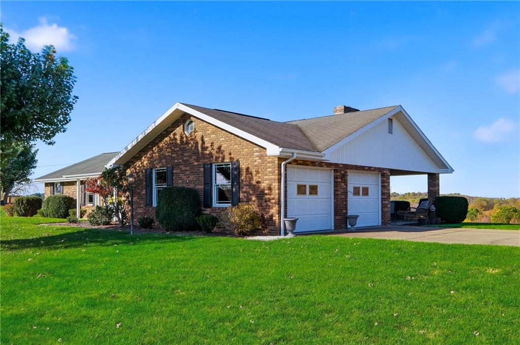 127 East Buffalo Church Road Washington, PA 15301 - Photo 28 of 33 a front view of house with yard and green space