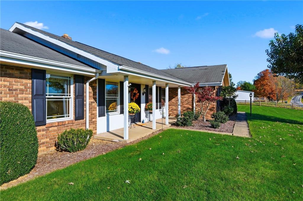 127 East Buffalo Church Road Washington, PA 15301 - Photo 32 of 33 front view of a house with a yard porch and furniture