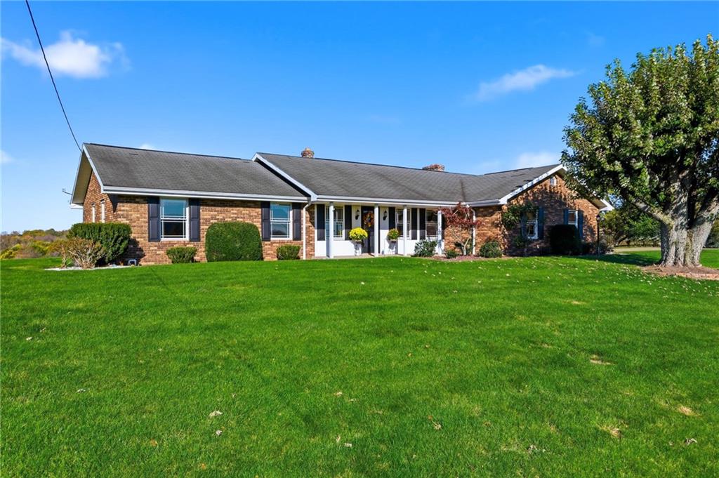 127 East Buffalo Church Road Washington, PA 15301 - Photo 33 of 33 a front view of house with a garden