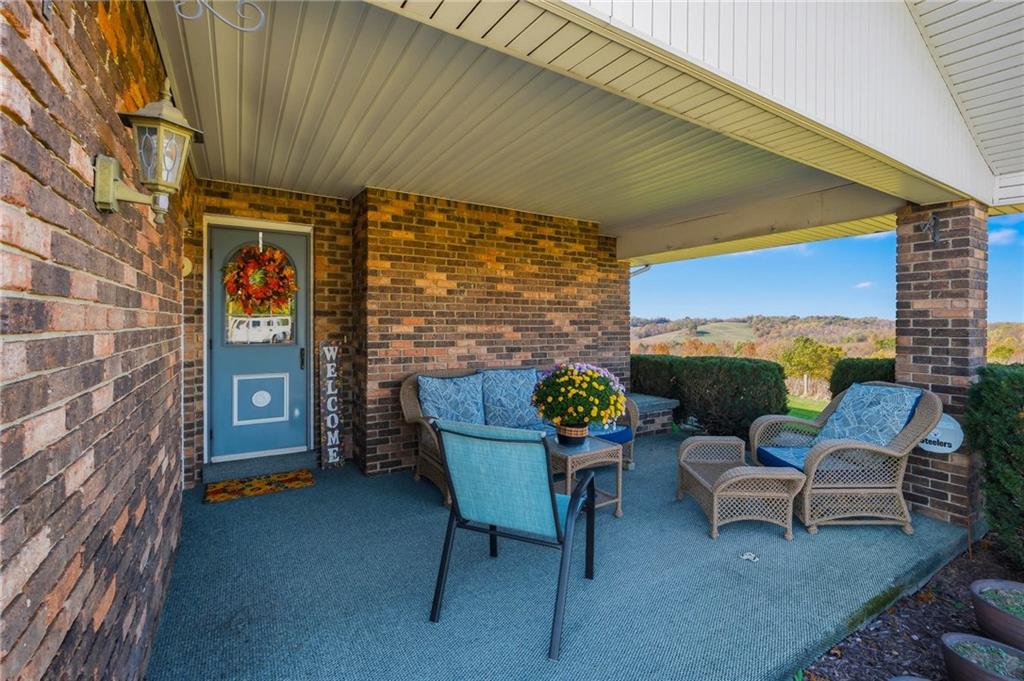 127 East Buffalo Church Road Washington, PA 15301 - Photo 5 of 33 a building outdoor space with patio furniture