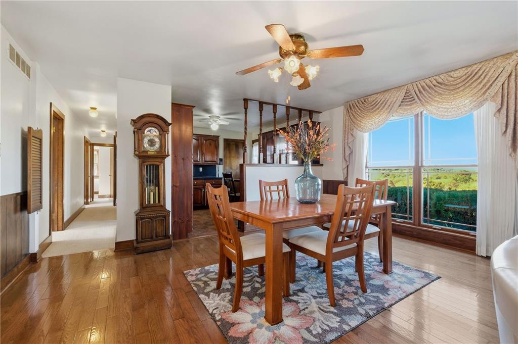 127 East Buffalo Church Road Washington, PA 15301 - Photo 8 of 33 a view of a dining room with furniture window and wooden floor