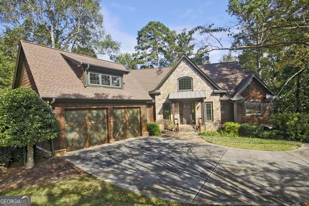 194 Edgewater Trail South Toccoa, GA 30577 - Photo 1 of 70 a front view of a house with a yard