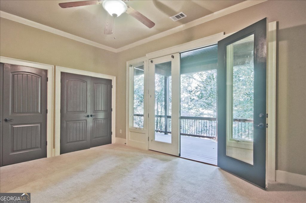 194 Edgewater Trail South Toccoa, GA 30577 - Photo 37 of 70 a view of an empty room with a window