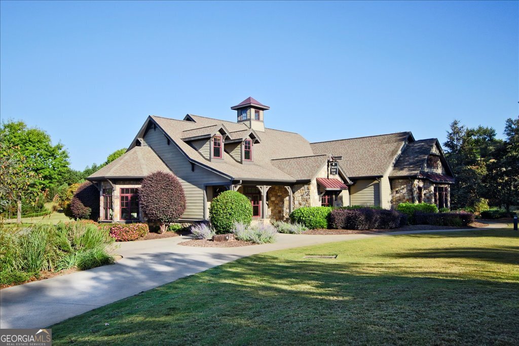 194 Edgewater Trail South Toccoa, GA 30577 - Photo 64 of 70 a front view of a house with a yard