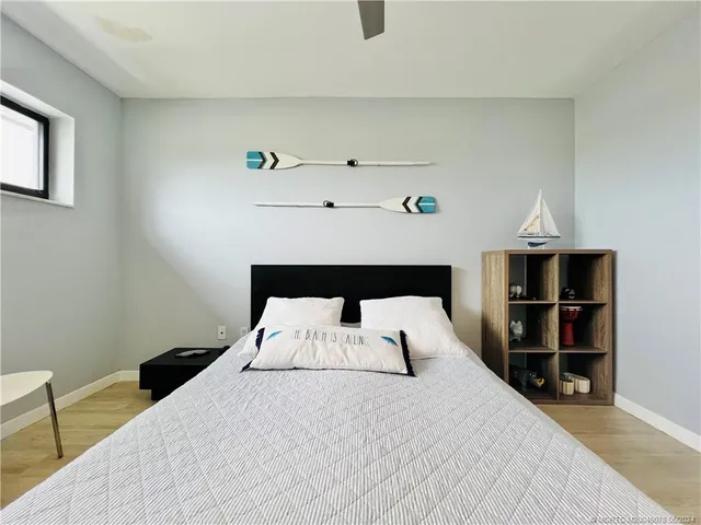 a view of a house with swimming pool and sitting area