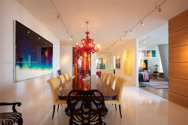 a kitchen with a refrigerator and a sink