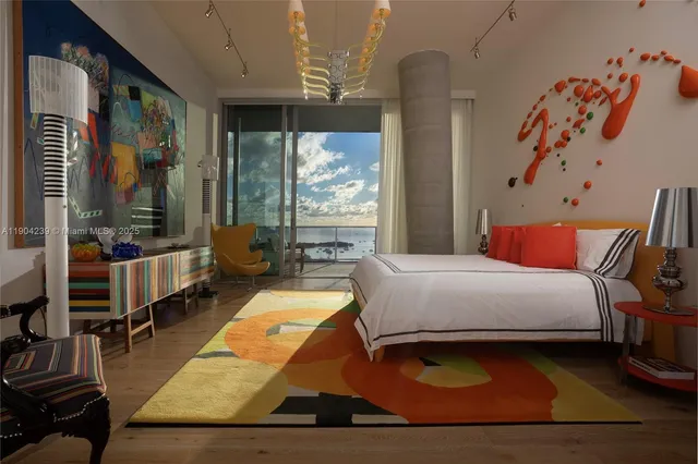 a bathroom with a toilet sink and shower