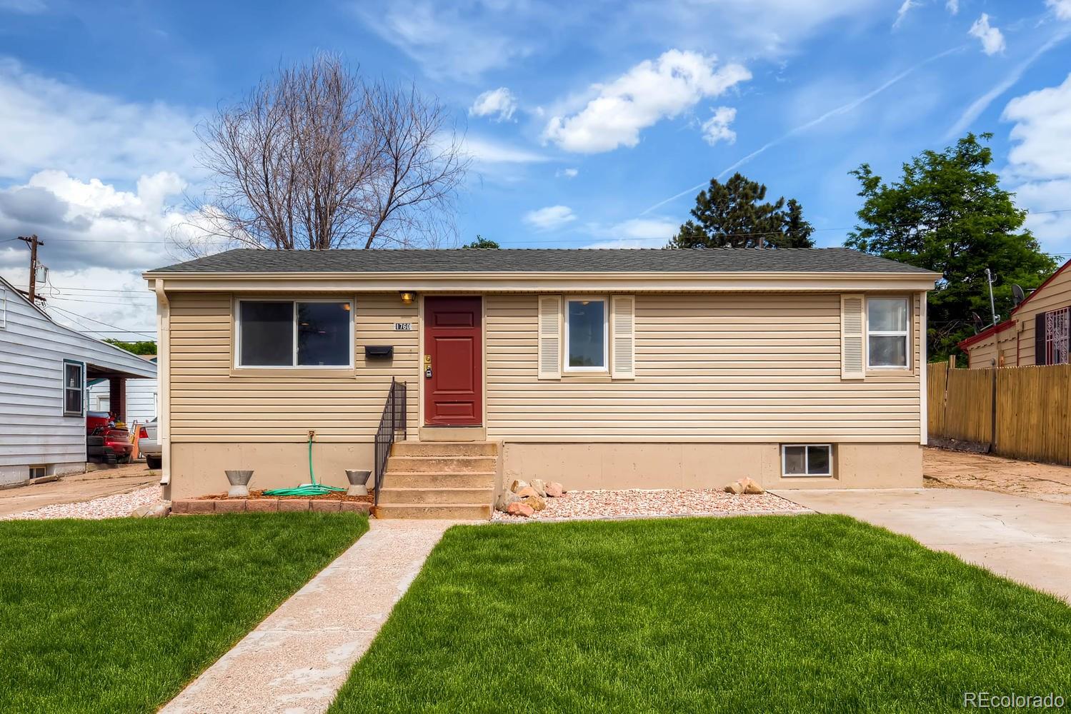 1760 South Java Way Denver, CO 80219 - Photo 2 of 28 a view of a house with a yard
