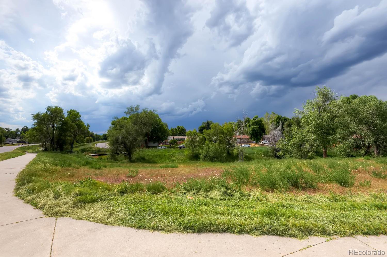 1760 South Java Way Denver, CO 80219 - Photo 28 of 28 a view of a garden with a houses