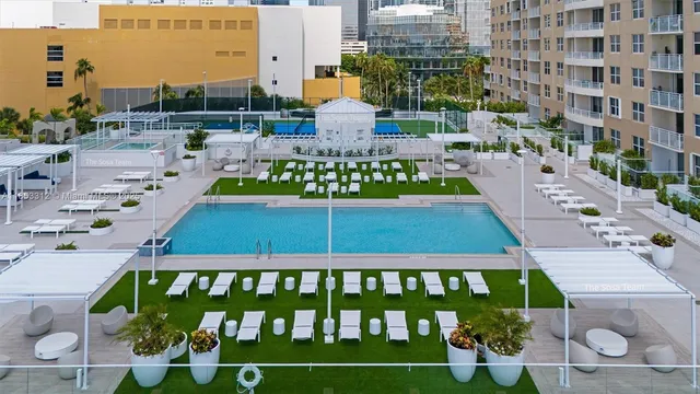 a room with lots of table and chairs