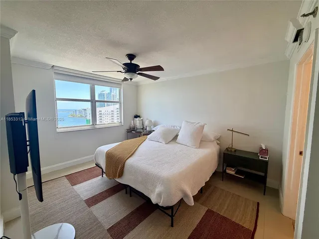 a bathroom with a sink toilet and mirror