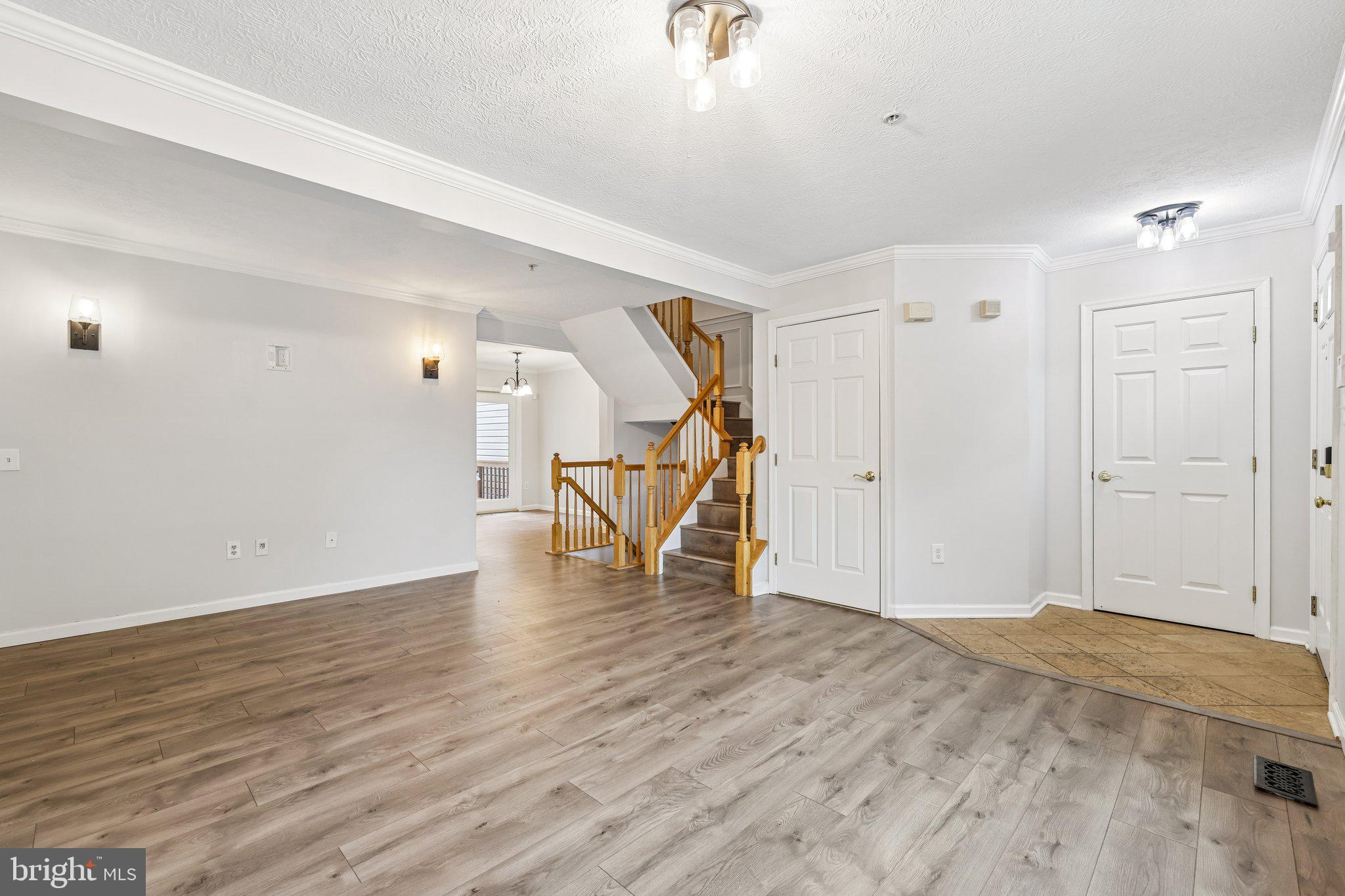 8727 Thornbrook Drive Odenton, MD 21113 - Photo 4 of 40 a view of empty room with wooden floor