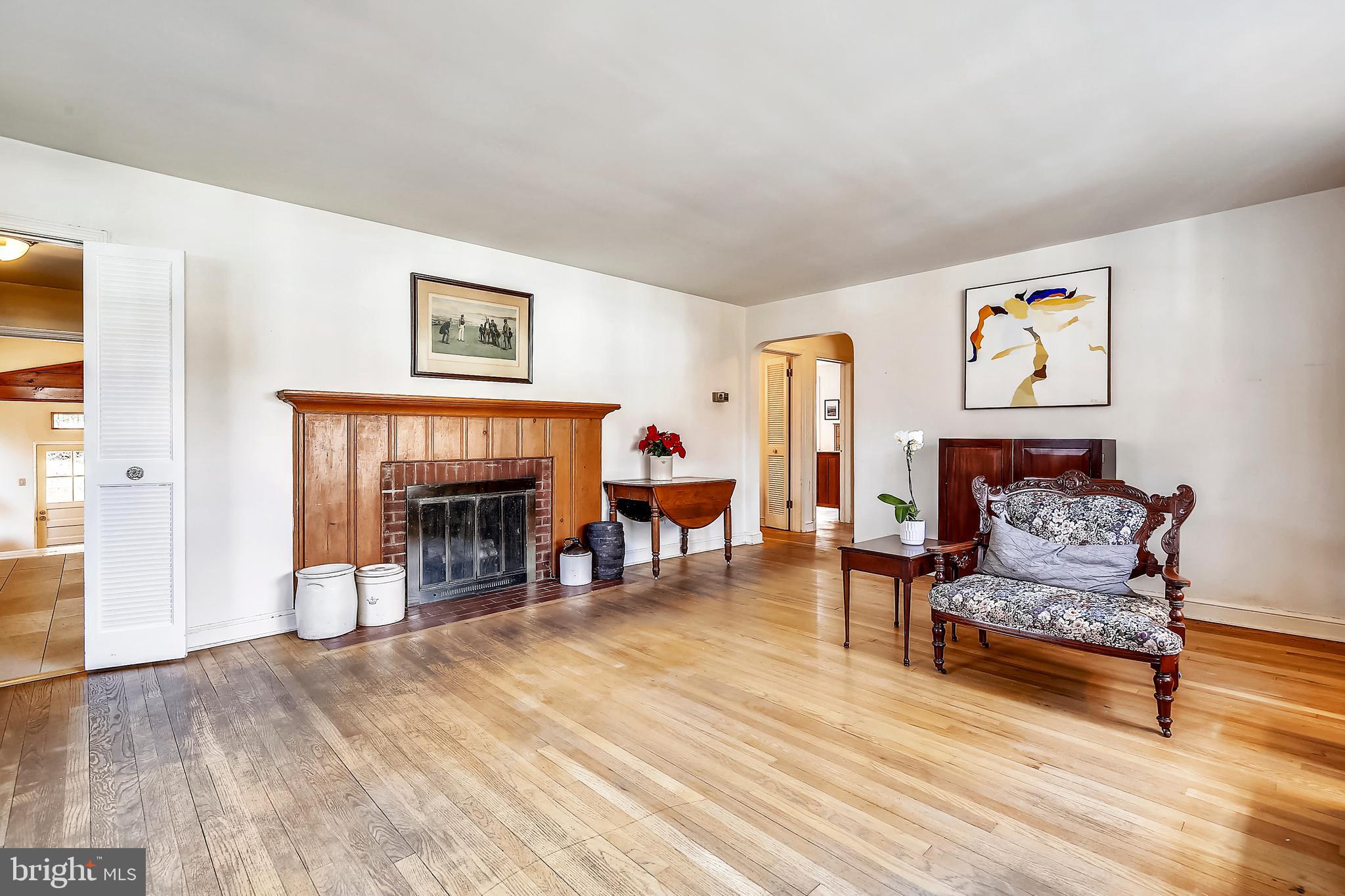 4518 Saul Road Bethesda, MD 20814 - Photo 3 of 43 Spacious LR with hardwood floors and fireplace