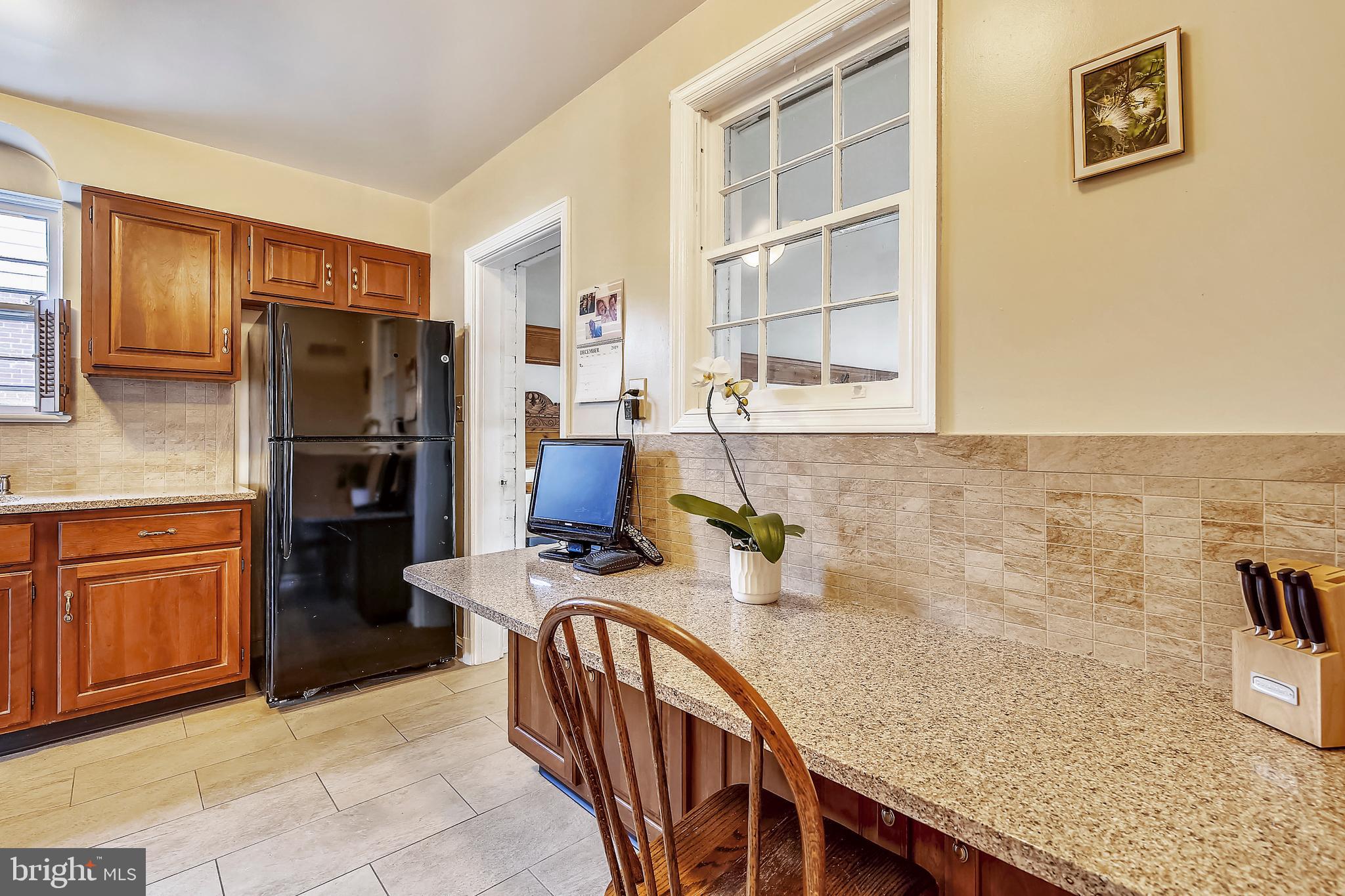 4518 Saul Road Bethesda, MD 20814 - Photo 8 of 43 Built in breakfast bar in kitchen