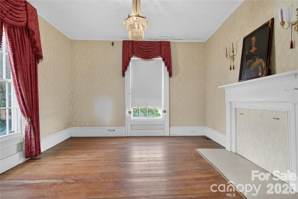 11124 Eastfield Road Huntersville, NC 28078 - Photo 9 of 41 a view of an entryway with wooden floor