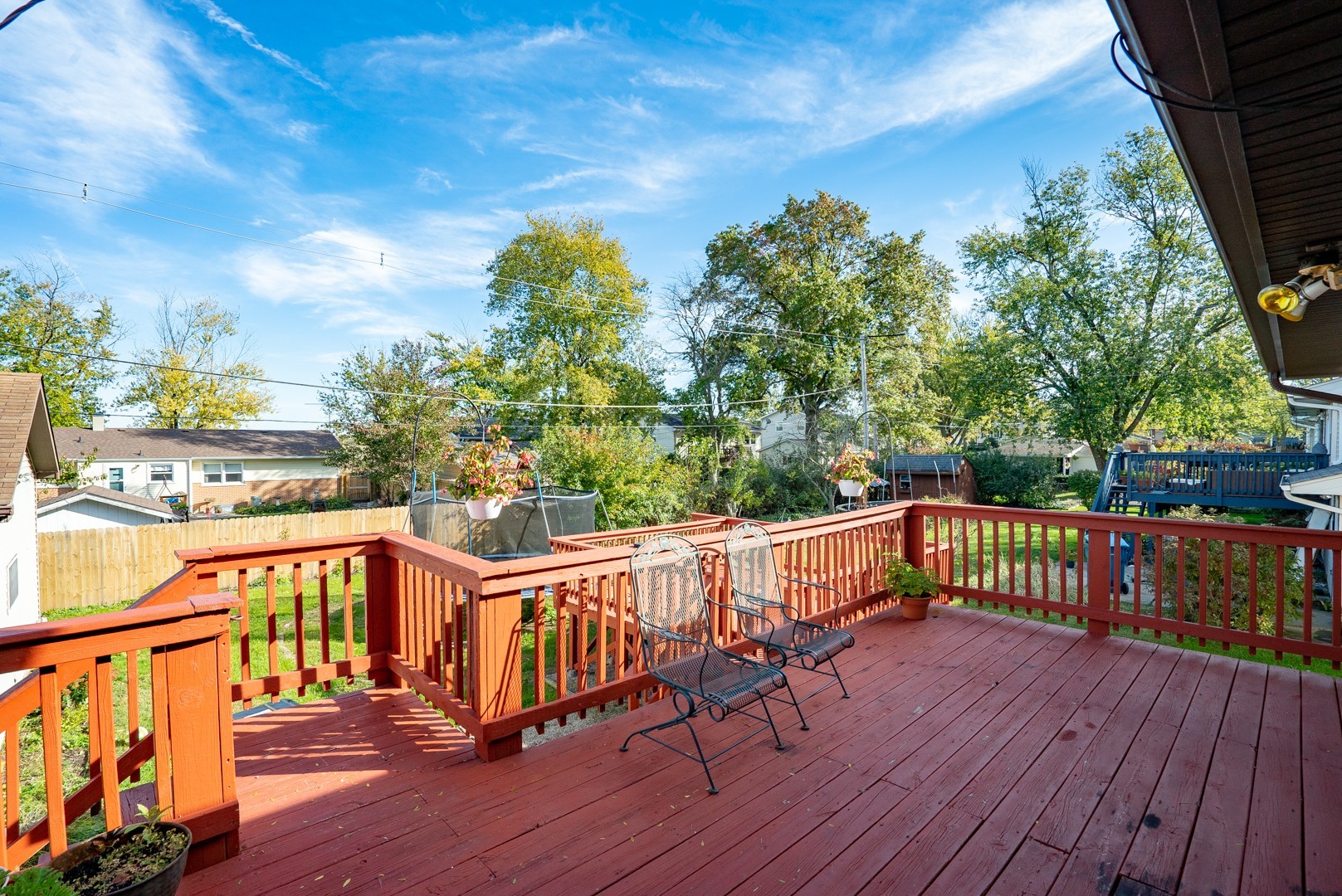 1425 Douglas Lane Crete, IL 60417 - Photo 16 of 19 a view of a balcony with wooden floor and outdoor seating