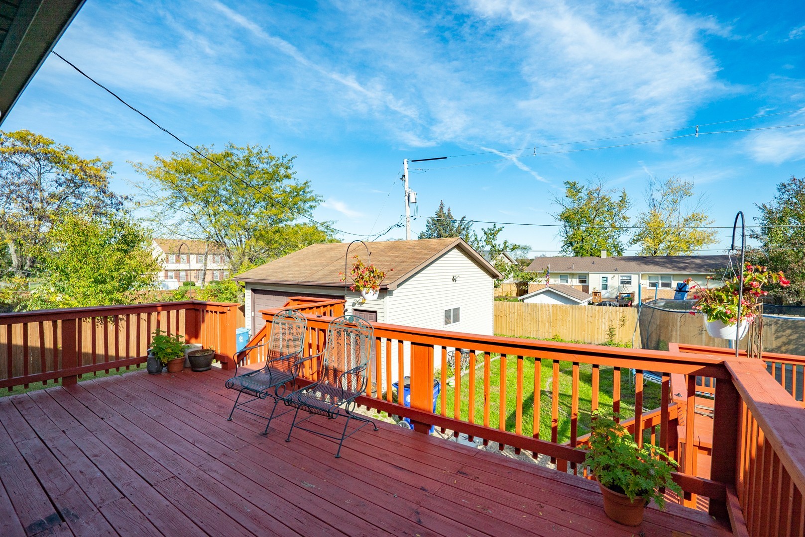 1425 Douglas Lane Crete, IL 60417 - Photo 17 of 19 a view of a balcony with wooden floor and outdoor seating
