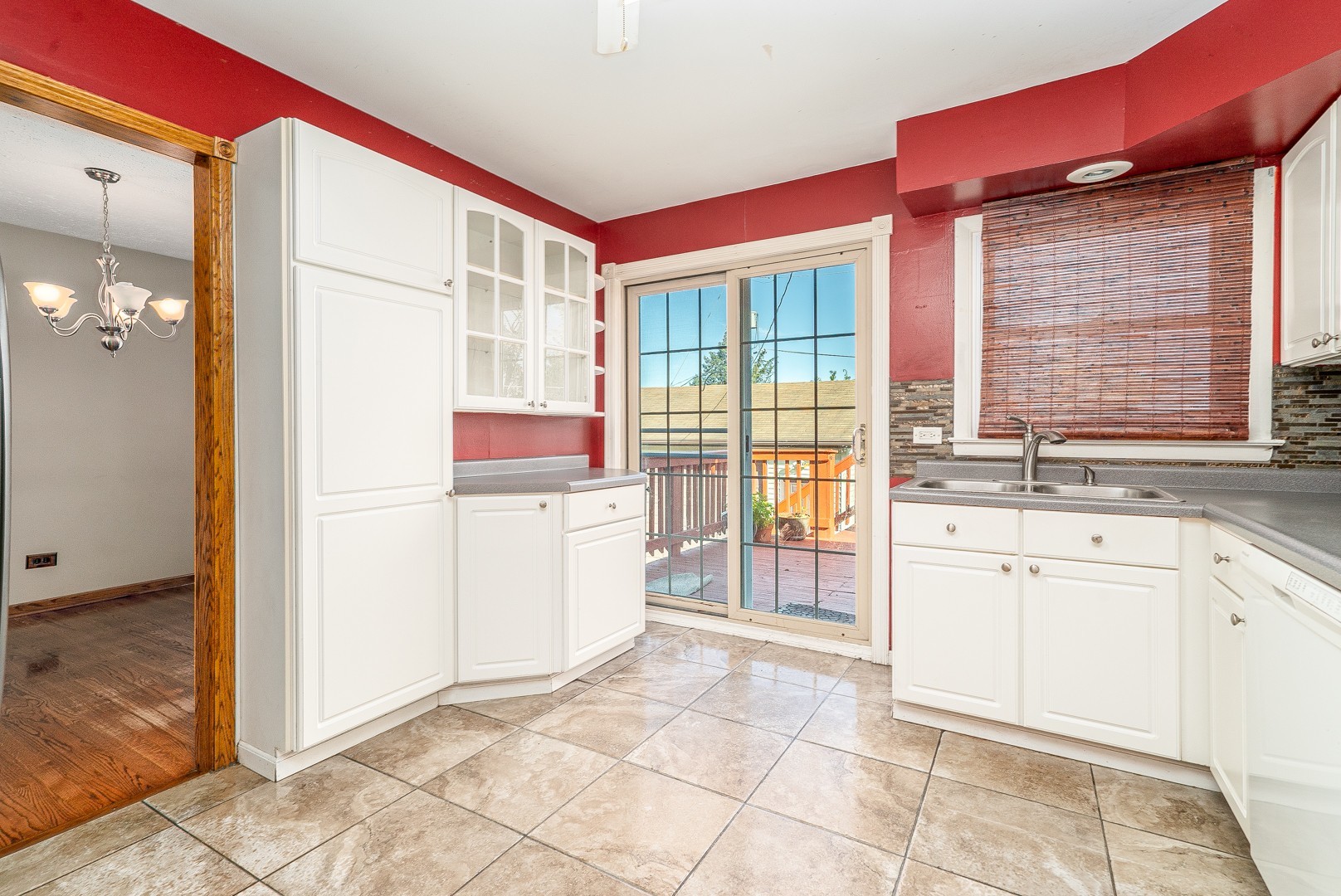 1425 Douglas Lane Crete, IL 60417 - Photo 6 of 19 a bathroom with a granite countertop sink and washing machine