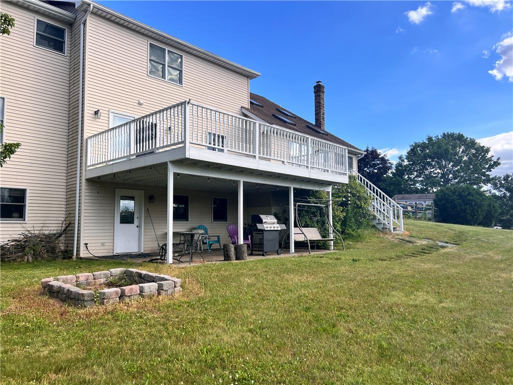 630 Clearfield Road Nazareth, PA 18064 - Photo 6 of 8 An inviting raised deck and patio provide ample space for outdoor enjoyment.