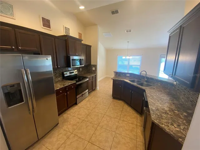 $1,975 | 2201 Angel Fish Loop, Leesburg, FL 34748