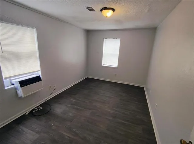 an empty room with a workbench