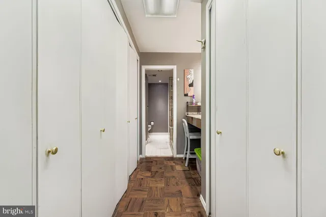 a view of a bathroom from a hallway