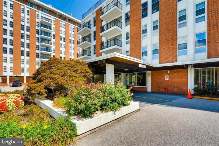 3601 Clarks Lane, Unit 508 Baltimore, MD 21215 - Photo 3 of 24 a view of a building with a garden