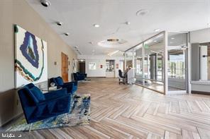 3601 Clarks Lane, Unit 508 Baltimore, MD 21215 - Photo 4 of 24 a living room with furniture and a fireplace