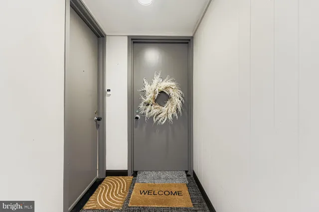 a view of entryway with a door