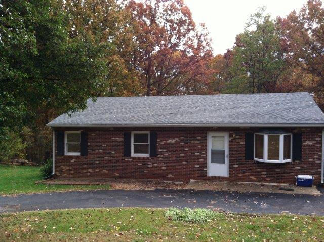 1650 Turner Branch Road Goodview, VA 24095 - Photo 2 of 48 a front view of a house with garden