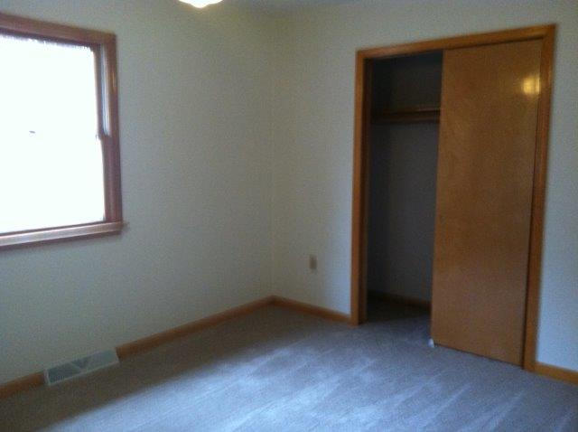 1650 Turner Branch Road Goodview, VA 24095 - Photo 14 of 48 an empty room with wooden floor and closet