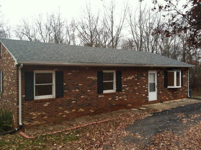 1650 Turner Branch Road Goodview, VA 24095 - Photo 3 of 48 a front view of a house with yard