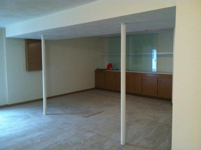 1650 Turner Branch Road Goodview, VA 24095 - Photo 23 of 48 an empty room with cabinet and mirrors