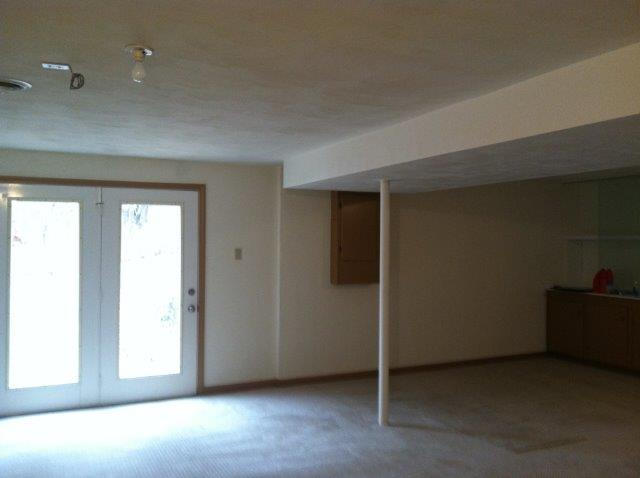 1650 Turner Branch Road Goodview, VA 24095 - Photo 24 of 48 an empty room with windows