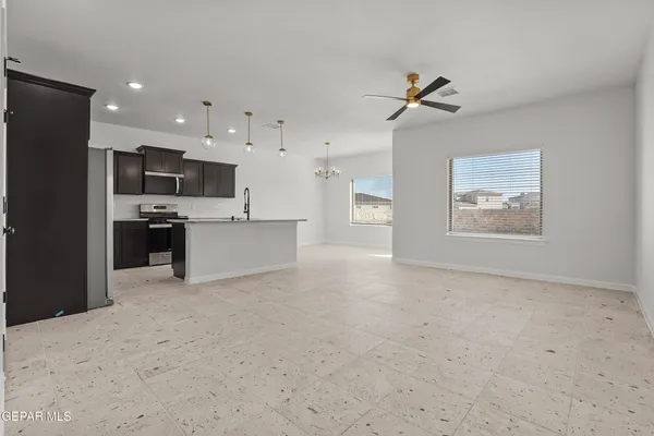 a view of a kitchen with a sink and a microwave