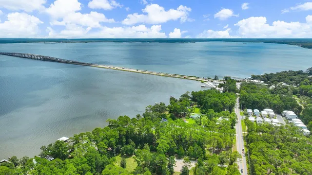 a view of a lake with a yard