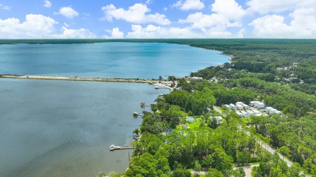 a view of a lake with a yard